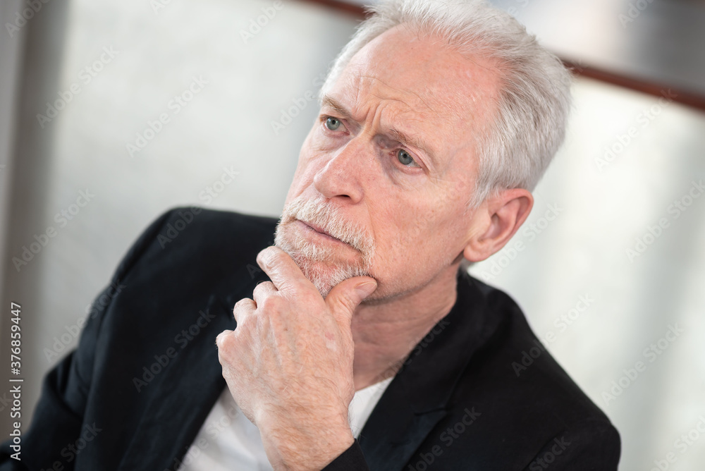 Portrait of thoughtful senior businessman Portrait of thoughtful senior businessman