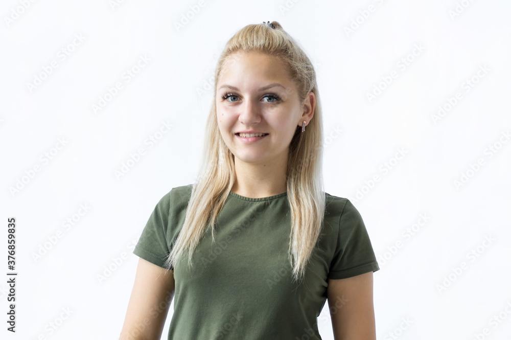 Pretty smiling joyfully female with fair hair, looking with satisfaction at camera, being happy. Beautiful woman isolated against blank studio wall. Pretty smiling joyfully female with fair hair, looking with satisfaction at camera, being happy. Beautiful woman isolated against blank studio wall.