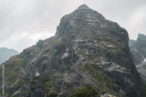 The view of the Koscielec mountain in Tatra mountains in Poland during summer, cloudy morning. © Lukasz Machowczyk