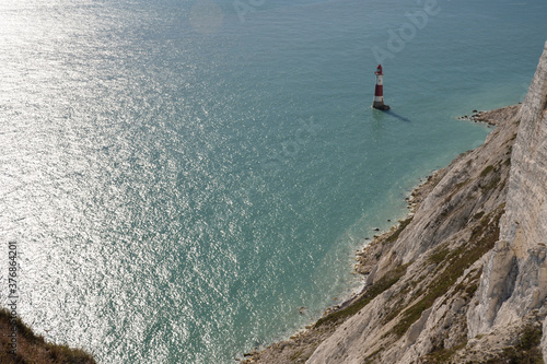 Beachy Head Lighthouse, view from a cliff near Eastbourne, White Cliffs of England, UK