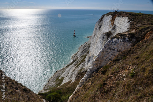 Beachy Head Lighthouse, view from a cliff near Eastbourne. Seven Sisters. White Cliffs of England, UK photo