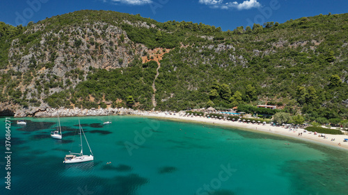 Aerial drone photo of popular crystal clear turquoise beach of Limnonari a safe sail boat anchorage, Skopelos island, Sporades, Greece © aerial-drone