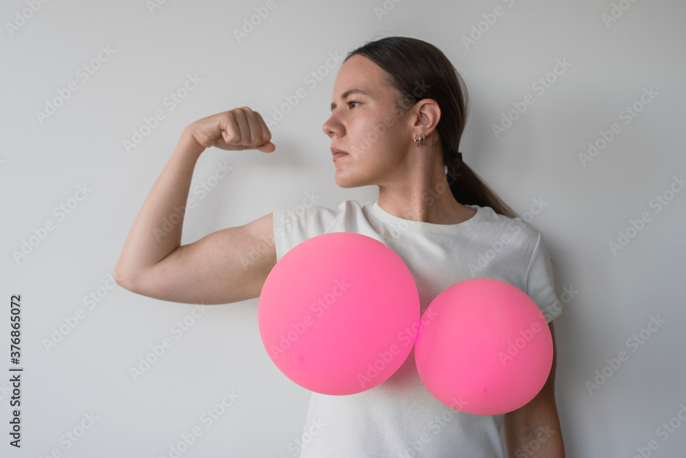 Woman with balloons on her breasts Woman with balloons on her breasts