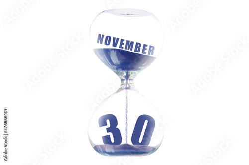 november 30th. Day 30 of month,Hour glass and calendar concept. Sand glass on white background with calendar month and date. schedule and deadline autumn month, day of the year concept