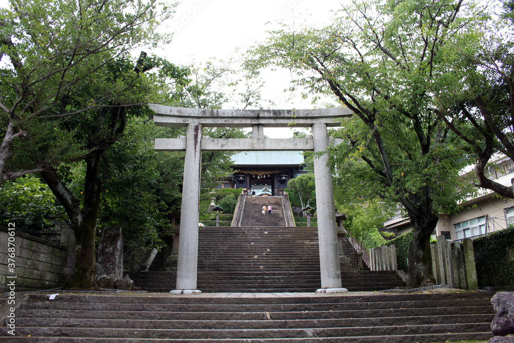 Entering the entrance gate of Suwa Shrine of Nagasaki from the main street. Entering the entrance gate of Suwa Shrine of Nagasaki from the main street.