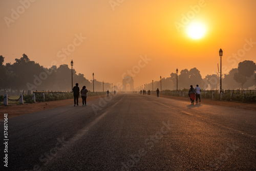 Silhouette of triumphal arch architectural style war memorial during hazy morning. Pollution level rises and causes smog in autumn season due stagnant winds. © anjali04