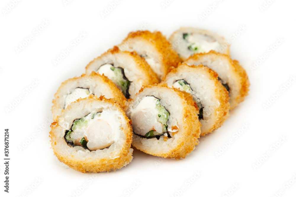 Tempura roll with shrimp on a white plate, classic Japanese sushi. Traditional Japanese food with maki. Delicious pieces of sushi. For the restaurant menu. copyspace