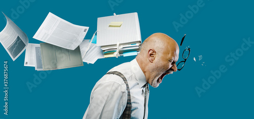 Quadro em tela Paperwork hitting a businessman's head