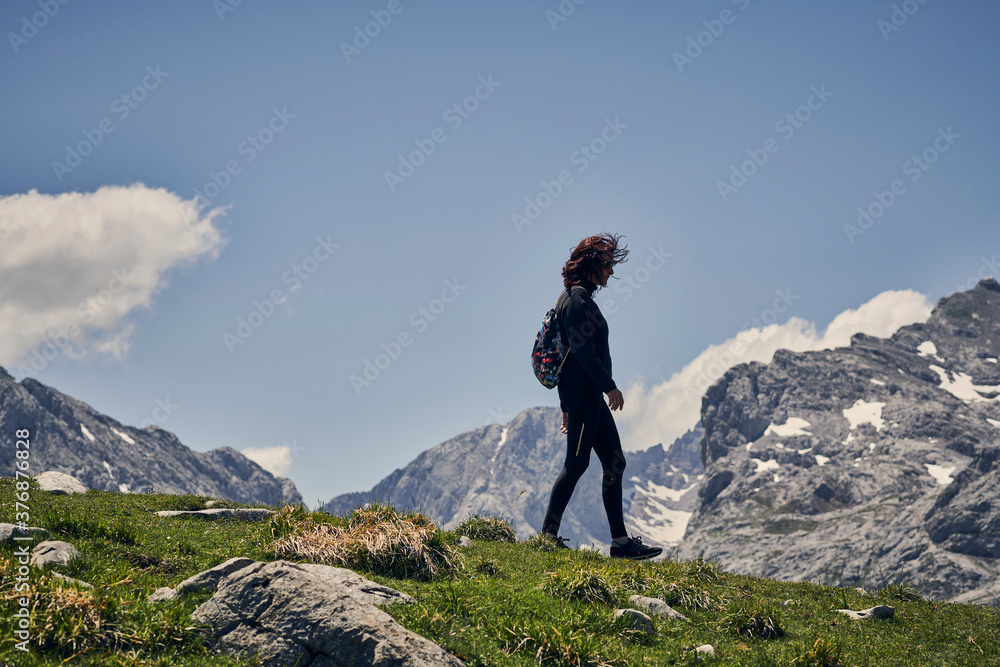 woman enjoying in the mountain, woman spending the holidays in the mountain