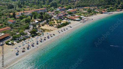 Aerial drone photo of famous crystal clear turquoise beach and bay of Panormos a popular safe sail boat anchorage in island of Skopelos, Sporades, Greece