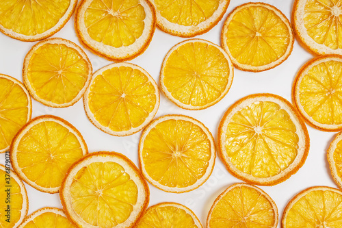 Dried orange slices close-up on the white background,