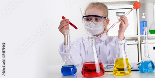 Girl doing experiments in the laboratory