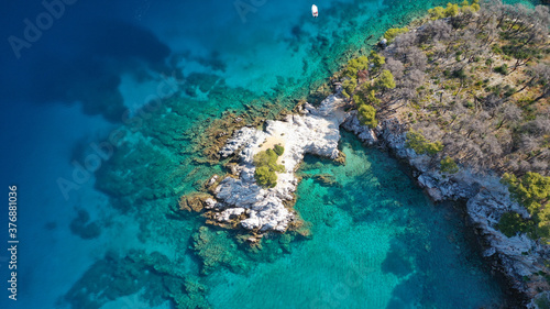Aerial drone photo of tropical exotic bay with turquoise rocky seascape in Caribbean destination island © aerial-drone