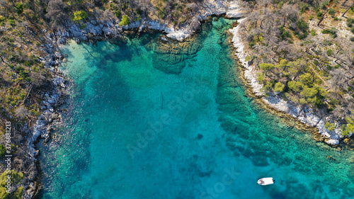 Aerial drone photo of famous from Mamma Mia movie Three pine cape Amarantos a trully scenic place with crystal clear sea  Skopelos island  Sporades  Greece