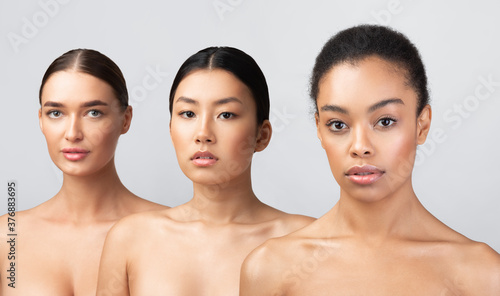 Multiracial Women With Perfect Faces And Skin Posing In Studio