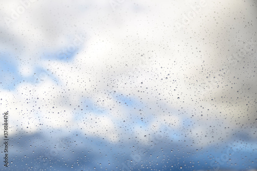 Droplets Of Rain Water On Windowpane. Background concept © luismicss