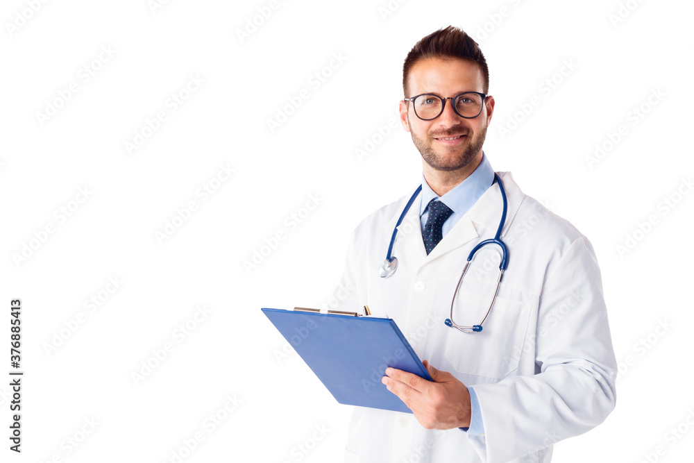 Male doctor portrait while standing at isolated white background Male doctor portrait while standing at isolated white background