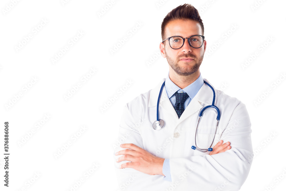Male doctor portrait while standing at isolated white background Male doctor portrait while standing at isolated white background