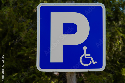 handicapped parking sign, green background
