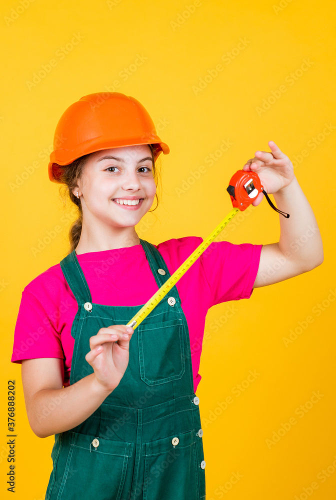 length. construction worker with tape measure. Cute kid as a