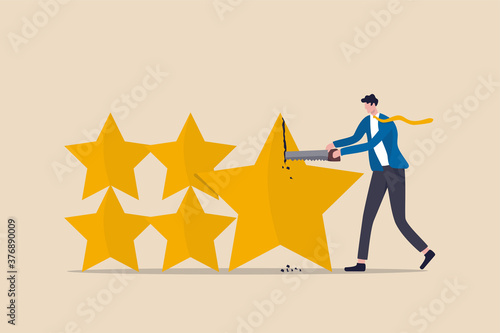 Investment rating downgrade, credit score of mortgage or bond or corporate loan concept, businessman credit score staff sawing star to downgrade or reduce score.