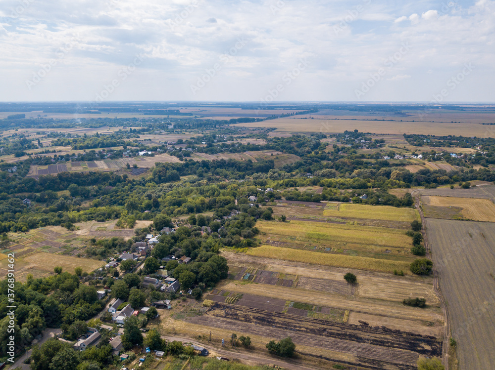 Agricultural village in Ukraine. Aerial drone view. Agricultural village in Ukraine. Aerial drone view.
