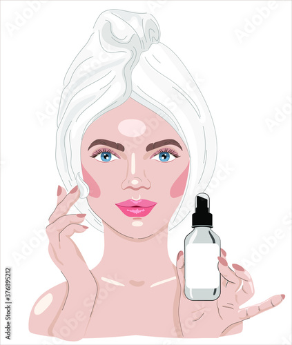 Beautiful young woman with towel on her head. Advertising of cream, serum, essence. Girl after shower. 
Face cosmetics