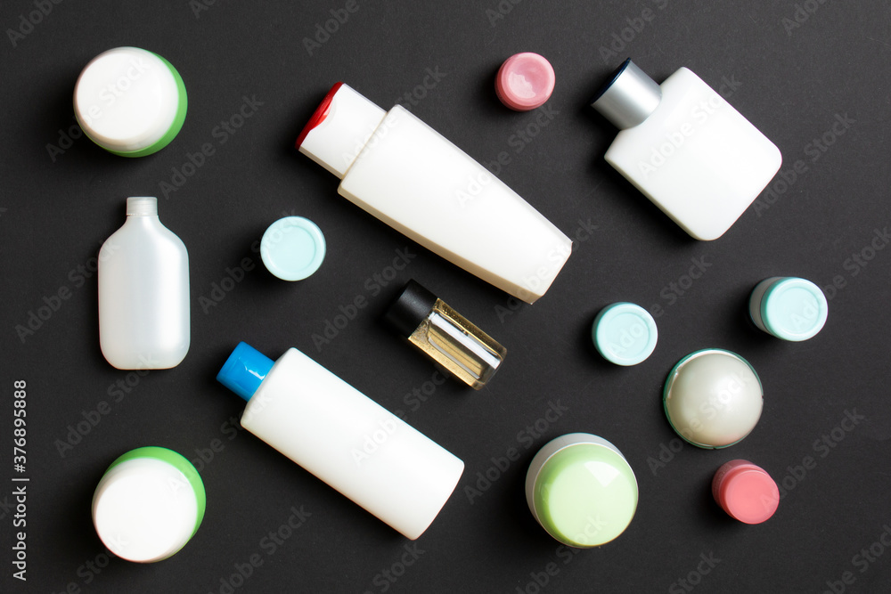 Group of plastic bodycare bottle Flat lay composition with cosmetic products on colored background empty space for you design. Set of White Cosmetic containers, top view with copy space Group of plastic bodycare bottle Flat lay composition with cosmetic products on colored background empty space for you design. Set of White Cosmetic containers, top view with copy space