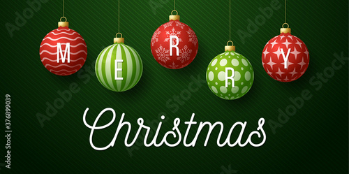 Christmas horizontal promo banner. Holiday vector illustration with realistic ornate red and green Christmas balls on green background.