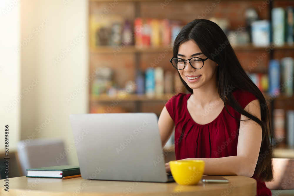 Smiling Asian Student Girl Preparing Exam With Laptop In Cafe, Studying Online Smiling Asian Student Girl Preparing Exam With Laptop In Cafe, Studying Online