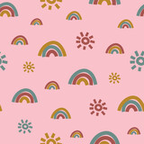 Rainbows and suns seamless vector pattern on pink. Simple chidish surface print design for fabrics, stationery, scrapbook paper, packaging, gift wrap, and packaging.