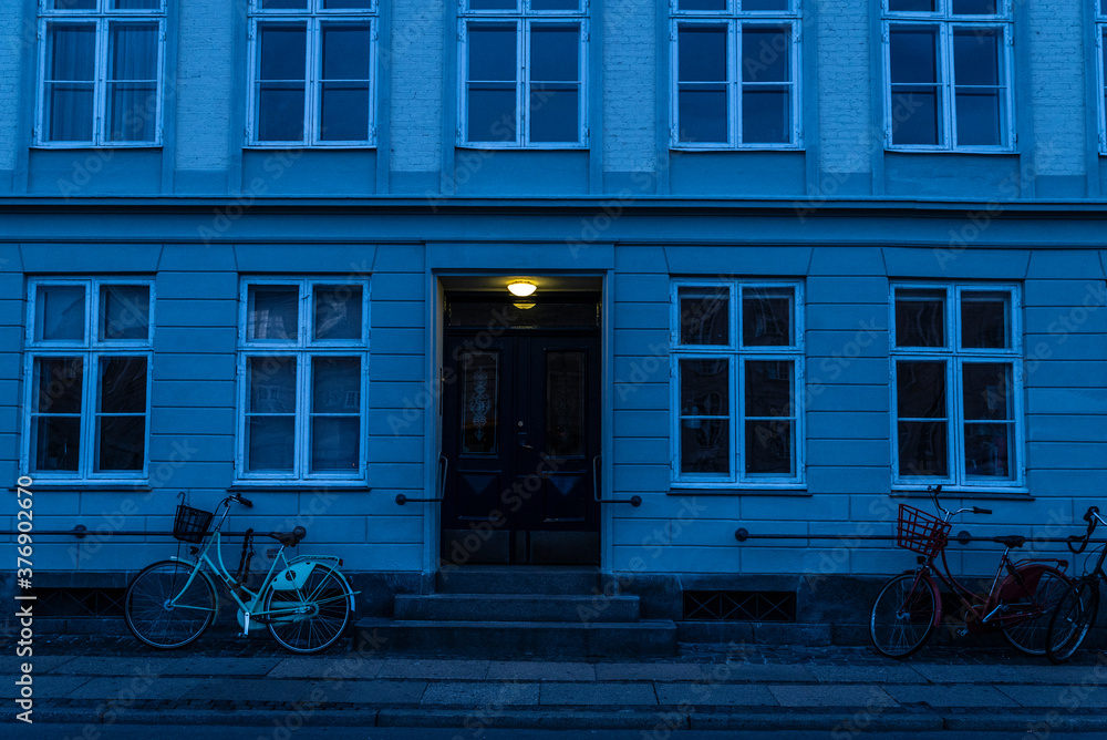 Old classic house with parked bicycles in Copenhagen, Denmark