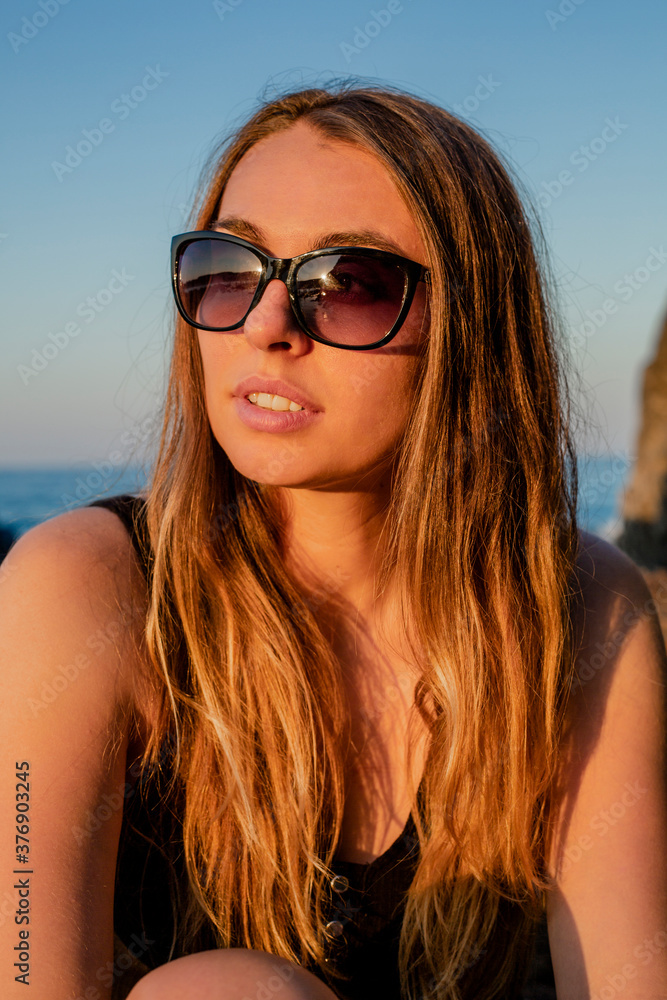 Close up portrait of lovely blond woman. Pretty happy lady enjoying summer outdoors. Positive emotion life success mind peace concept Close up portrait of lovely blond woman. Pretty happy lady enjoying summer outdoors. Positive emotion life success mind peace concept