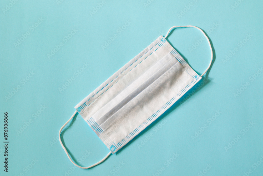medical face mask on blue background medical face mask on blue background