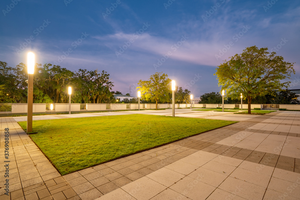 City garden with lights photo at twilight