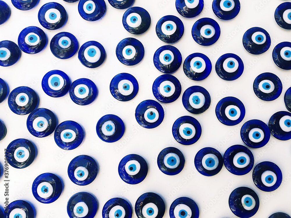 Traditional blue glass beads. Famous Good luck amulet to protect against evil eye in turkish culture. Traditional blue glass beads. Famous Good luck amulet to protect against evil eye in turkish culture.