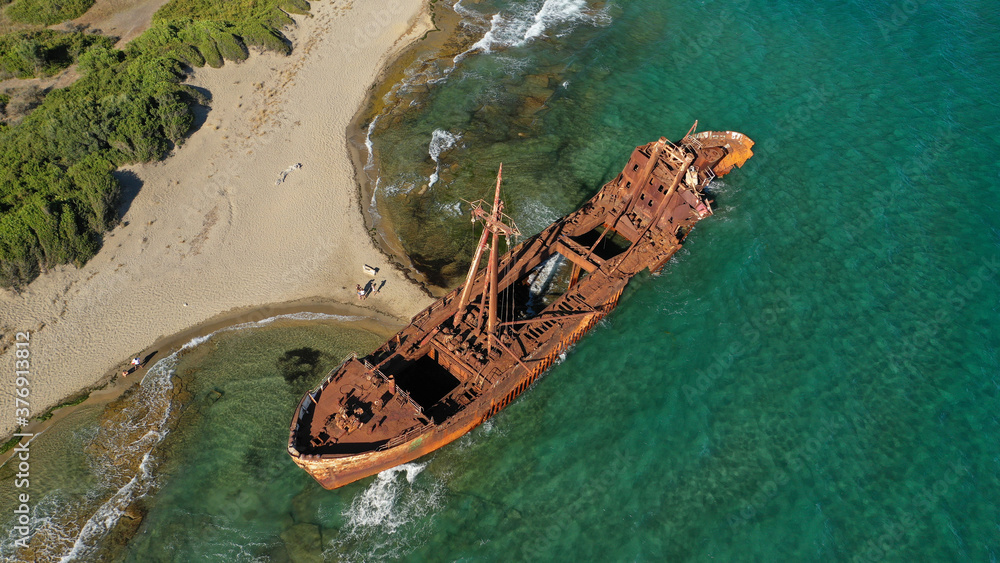 Aerial drone photo of famous shipwreck of Agios Dimitrios abandoned in Selinitsa bay near Gythion village, Peloponnese, Greece