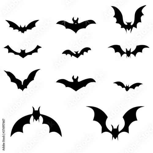 Black silhouettes of bats set on white background. vector illustration