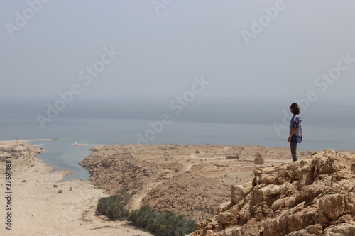 Qalhat  Beach in Oman and Mountains of Hajar 