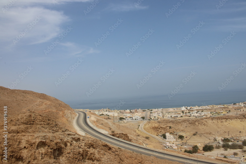 Qalhat, Beach in Oman and Mountains of Hajar 