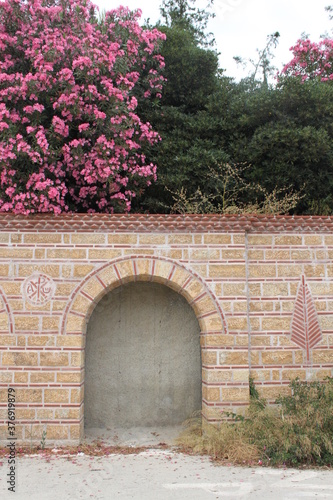 Old Brick Wall | Arch With Pink Flowers | Red Wall Will Blooming Flowers