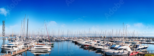 Yacht club and marine deck long view. Boat, yacht,ship & marina. © naci
