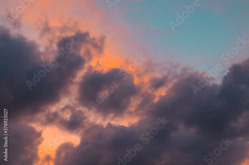 low angle view of clouds in sky during sunset, dramatic cloud formation during the sunset