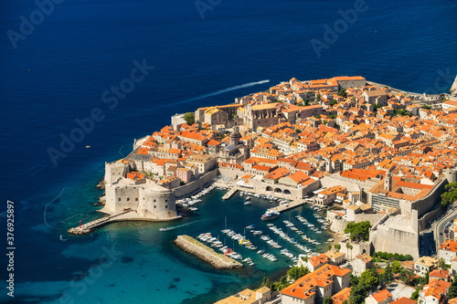 Dubrovnik, Croatia. View on the old town from high mountain. Top view rocks at on the old castle and blue sea. Vacation and adventure. Travel - image
