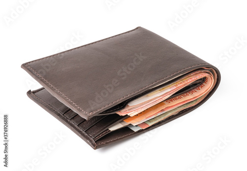 Isolated of brown leather wallet with money banknotes on white background. Clipping path.