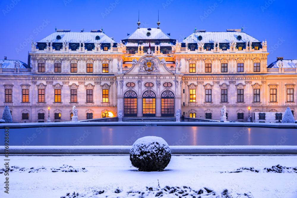 Vienna, Austria - Winter snowy night at Belvedere, travel landscape.