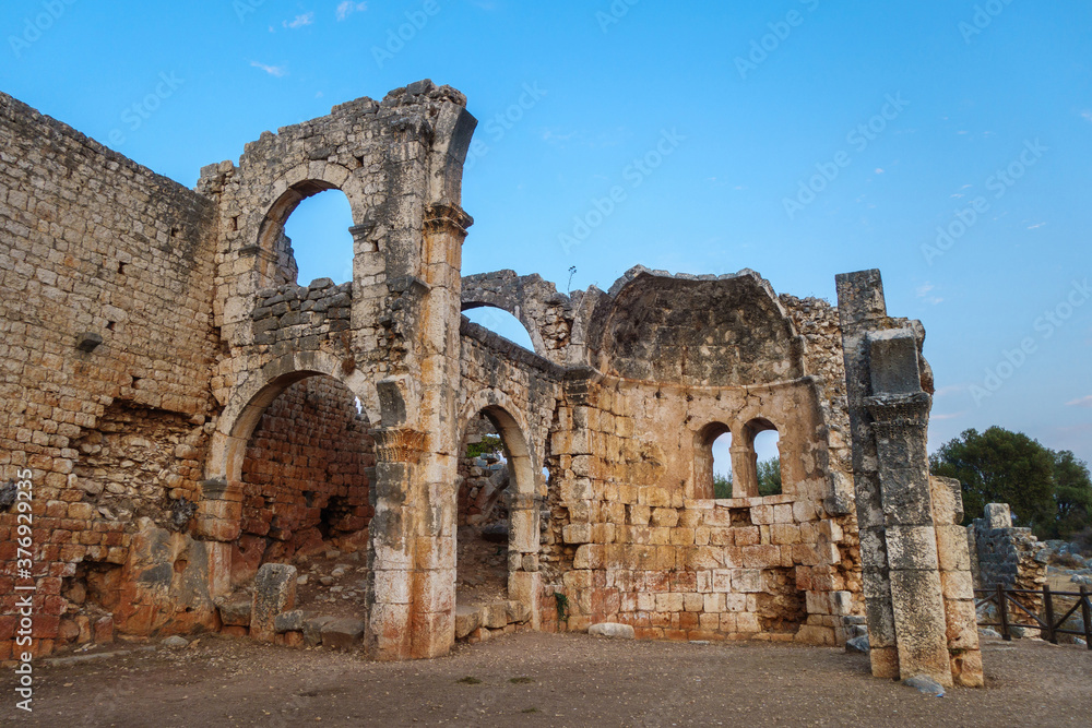 Ruins of basilica in ancient city Kanli Divane or Canytelis, Ayaş, Turkey. Architecture is typical for Roman. City was Christian religious center, abandoned in early medieval