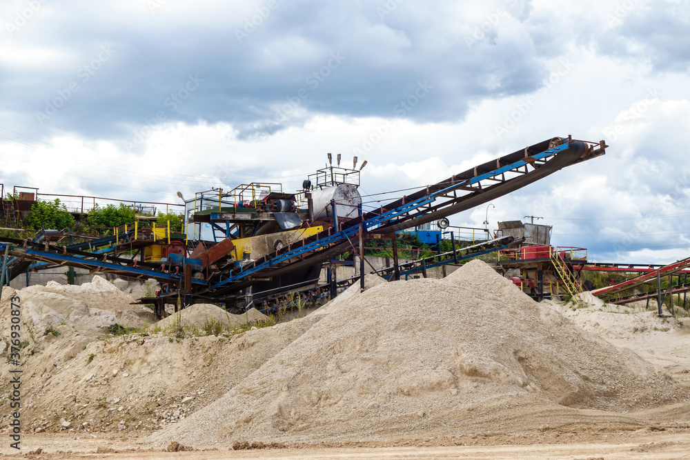 Complex of quarry equipment such as stone crushers and conveyors, dumps of prosessed minerals Complex of quarry equipment such as stone crushers and conveyors, dumps of prosessed minerals