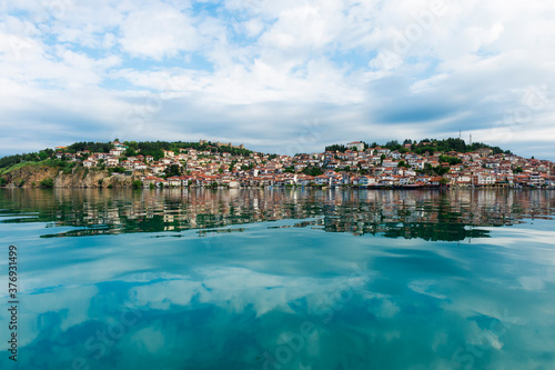 Fototapeta Naklejka Na Ścianę i Meble -  Ohrid old city reflecting in Lake Ohrid, Macedonia