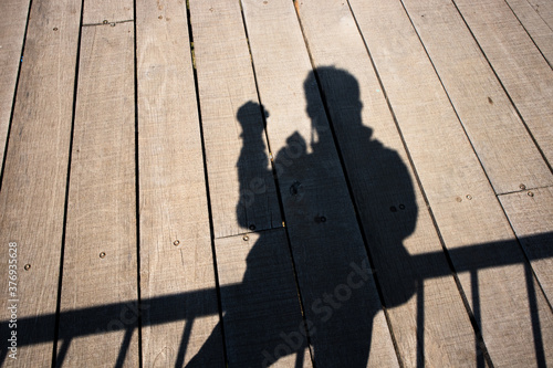 shadow of a photograph on the bridge surface